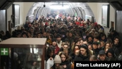 People take shelter in a metro station during an air raid alert in Kyiv, Ukraine, on December 20.&nbsp;