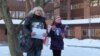 Volha Klaskouskaya (left)protests outside the Belarusian Embassy in Stockholm in January 2011.