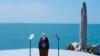 U.S. President Joe Biden delivers a speech on the legacy of Pointe du Hoc, and democracy around the world, on June 7 as he stands next to the Pointe du Hoc monument in Normandy, France.
