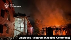 Buildings are damaged and in flames after an attack on Kremenchuk, Ukraine, on June 6