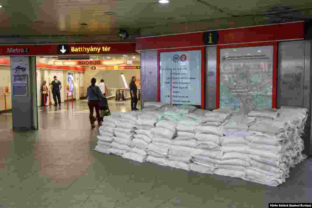 Sandbags are placed at the entrance to a subway station at Budapest&#39;s Bathyany Square on September 19. &nbsp;