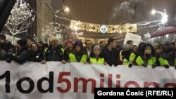 Antigovernment protesters mass on the streets of the Serbian capital of Belgrade on December 15.