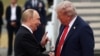 Доналд Трамп (рост) ва Владимир Путин (чап). Аляска, Амрико. 15-уми августи 2025