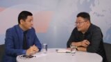 Kazakhstan – AzattyqLIVE expert Aidos Sarym (R) and Kassym Amanzhol. Almaty, 29Apr2019