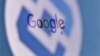 The logo of Russia's state communications regulator, Roskomnadzor, is reflected in a laptop screen showing the Google start page.