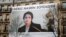 FRANCE -- A banner with a giant portrait of jailed Iranian lawyer Nasrin Sotoudeh is seen on the headquarters of the French National Bar Council, demanding her release, in Paris, March 28, 2019