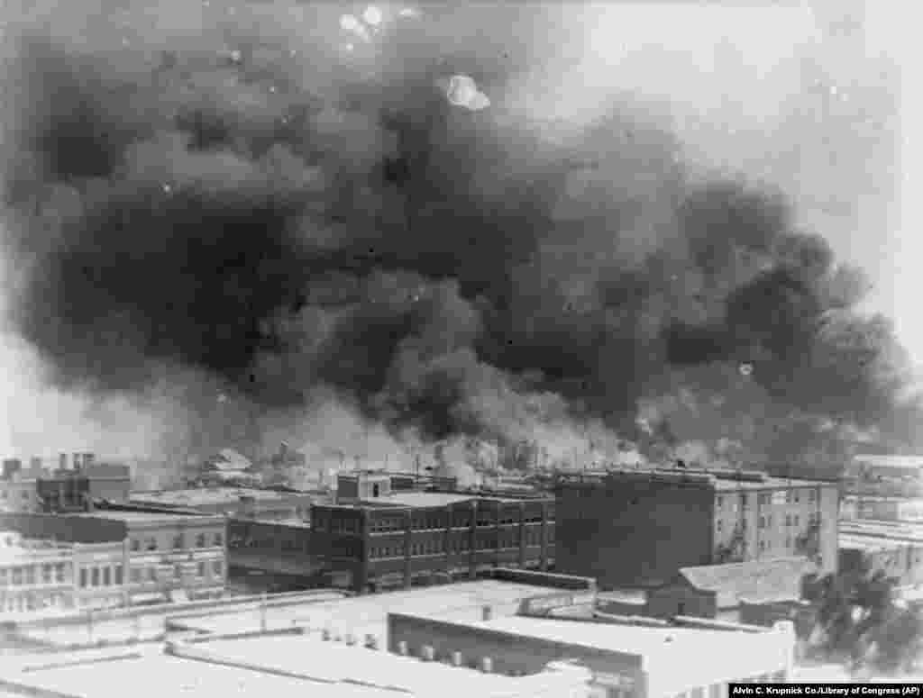 Smoke billows over Tulsa, Oklahoma, June 1, 1921