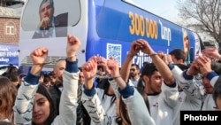 Armenia - Supporters of billionaire Samvel Karapetian rally outside a court in Yerevan, March 13, 2026.