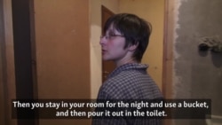 Russians Try To Make Ends Meet In Bleak Communal Apartment