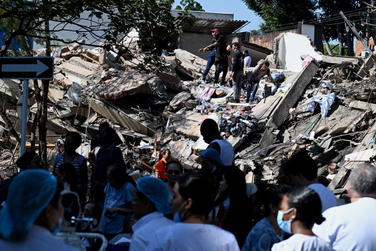 People search the rubble for survivors, Colombia, August 10, 2026