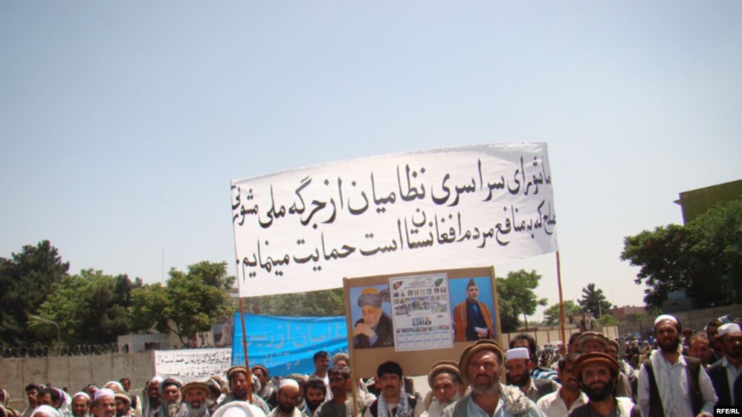 Afghans turned out in Kabul on May 25 to show their support for the peace jirga, which was delayed a second time.