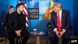US President Donald Trump and Ukraine's Volodymyr Zelenskyy meet on the sidelines of NATO summit in The Hague in June.