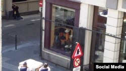 A picture from Brussels released on social media. (The suspected bomb suspect is in the top left corner of the image)