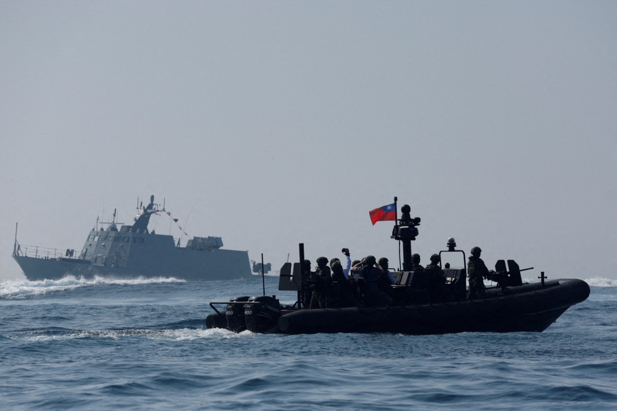 Taiwanese navy personnel take part in exercises during a media demonstration at a naval base in Kaohsiung.
