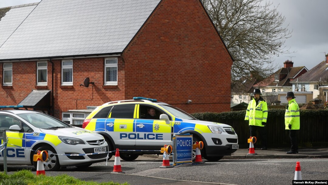 Police officers guard the cordoned-off area around the home of former Russian intelligence officer Sergei Skripal in Salisbury, Britain, on April 3.