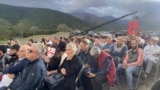 In Kvareli, opposition parties hold a rally at sunset.