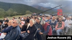 In Kvareli, opposition parties hold a rally at sunset.