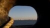 IRAN -- A general view of an oil dock is seen from a ship at the port of Kalantari in the city of Chabahar, 300km (186 miles) east of the Strait of Hormuz, January 17, 2012