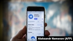 RUSSIA -- This illustration picture taken on April 6, 2018 in Moscow shows the Telegram messenger application displayed on the screen of a smartphone.