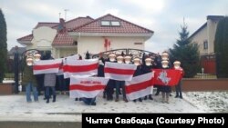 Opposition protesters gather for one of the many small demonstrations across Belarus on December 27.