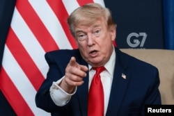 Američki predsednik Donald Tramp razgovara s novinarima na marginama samita G7 u Francuskoj, 16. jun 2026.