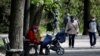 People enjoy walking in the Lazienki Royal Park after a loosening of the lockdown measures by the government due to the coronavirus disease in Warsaw on April 20.