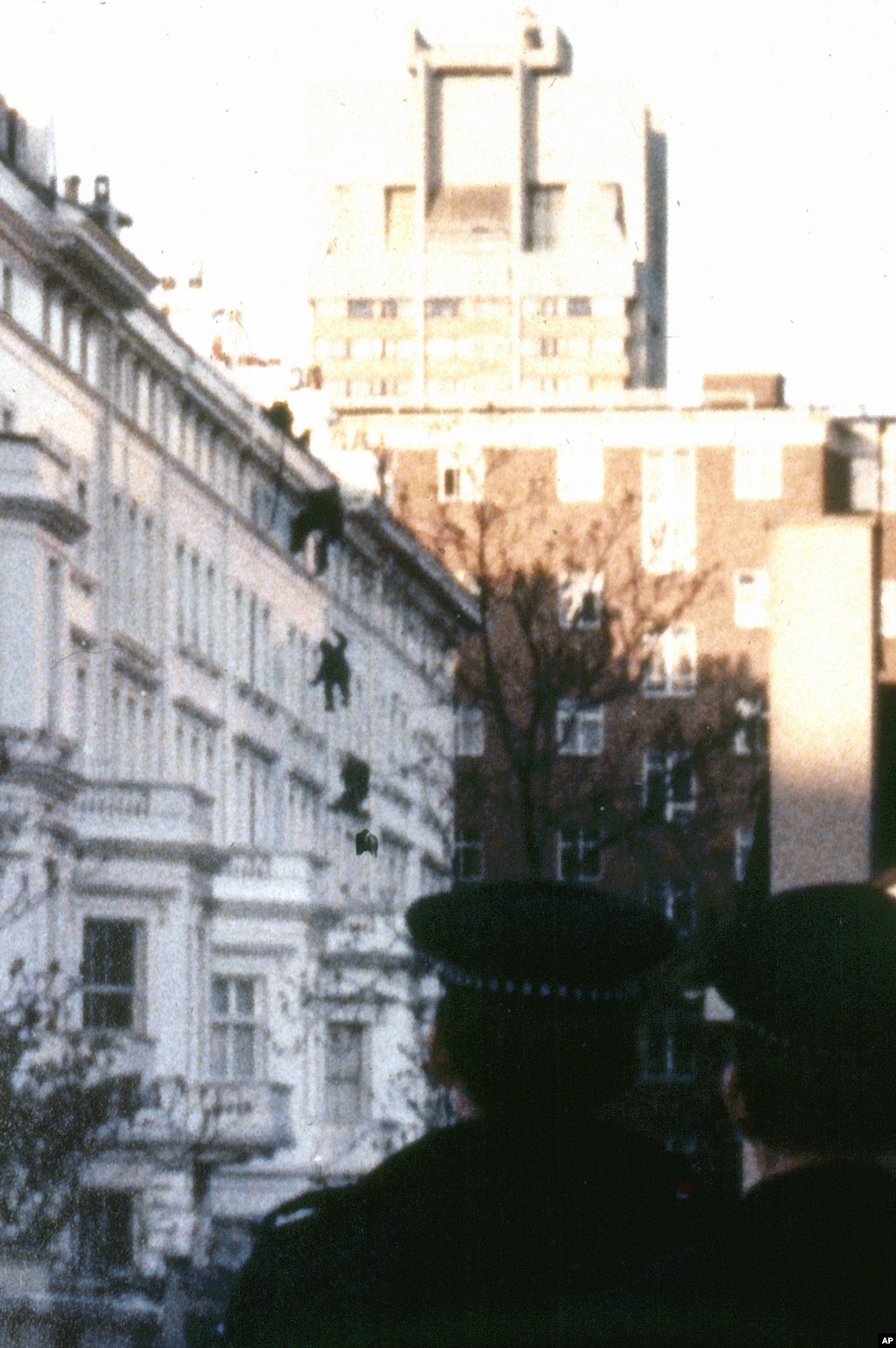 Elite members of Britain's SAS abseil down the wall at the rear of the embassy on May 5, 1980, to end the six-day siege.