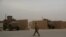 In this Wednesday, Nov. 8, 2017 photo, U.S. Marines are stationed in al-Asad air base in Anbar, Iraq. (AP Photo/Khalid Mohammed)