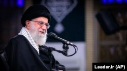 Iranian Supreme Leader Ayatollah Ali Khamenei attends a meeting with a group of air force officers in Tehran, February 8, 201