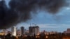 Smoke rises above Kyiv on July 11 following a Russian strike, with authorities saying ultra-fast ballistic missiles strained air defense systems.