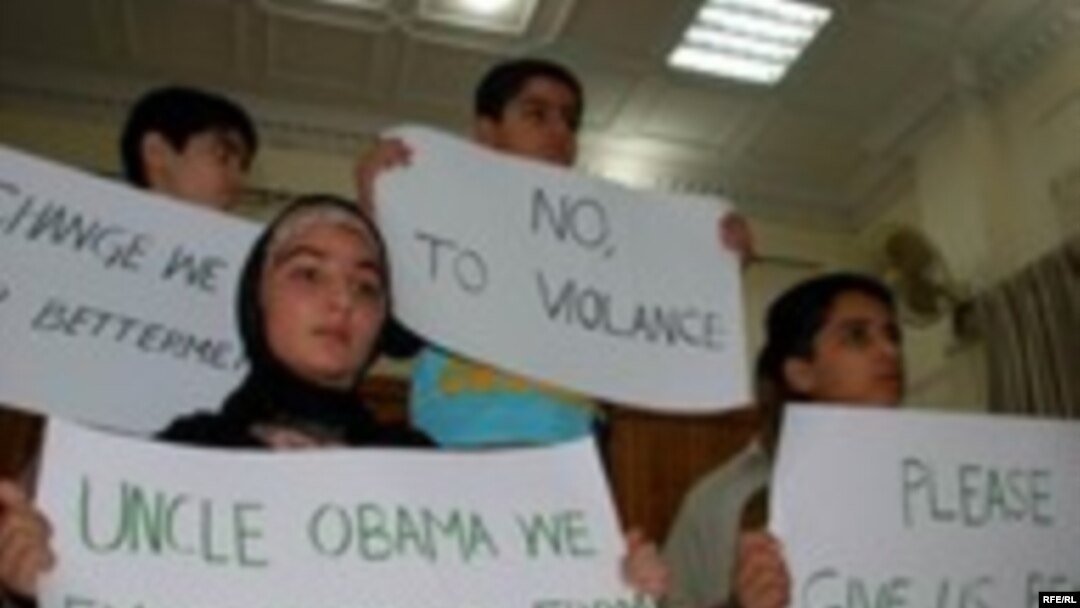 Pakistani children declare their support for Obama.