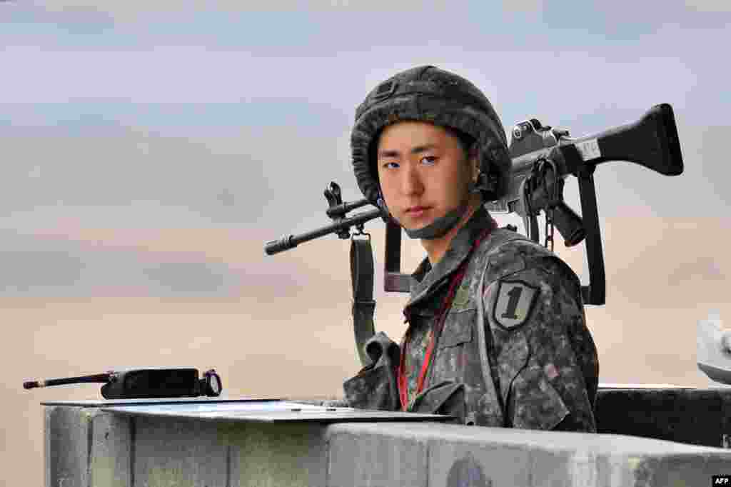 A South Korean soldier stands at a military guardpost near the demilitarized zone (DMZ) dividing the two Koreas in the border city of Paju, amid rising tensions with Pyongyang. (AFP/Jung Yeon-Je)