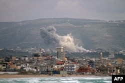 Smoke rises from the site of an Israeli airstrike that targeted the southern Lebanese village of Al Qlailah on May 16, 2026.