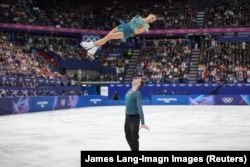 Лука Берулава мен Анастасия Метелкина олимпиадада өнер көрсетіп жатқан сәт. Милан. 16 ақпан 2026 жыл.