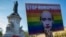 A demonstrator holders a placard depicting Russian President Vladimir Putin at a rally in Paris on April 20 to denounce the treatment of homosexuals in Chechnya.