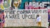 Graffiti la Munchen: „Coronavirus este un semnal de deșteptare și șansa noastră de a construi o societate nouă și plină de iubire”.