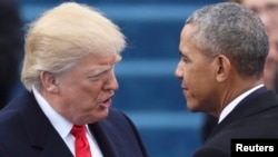 U.S. President Barack Obama (right) greets President-elect Donald Trump at his inauguration ceremony in Washington, D.C., on January 20.