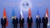 FILE: Presidents of the Shanghai Cooperation Organization (SCO) pose at the start of a summit in Tashkent in June.