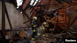 The aftermath of a Russian drone attack in Kyiv. Many Ukrainians living in the US feel unsafe to return home.