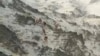 تصویری برگرفته از ویدئویی که ادعا می‌شود نیروهای فاطمیون را در حال ورود به ایران نشان می‌دهد