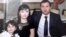Azerbaijani journalist Parviz Hashimli (right) with his family (undated)