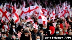 Tbilisi: participații la mitigul electoral al opoziției, înainte de alegerile generale din Geoorgia, joi, 29 octombrie 2020.