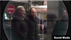 The Instagram post shows former Prime Minister Mikhail Kasyanov and antigovernment activist Vladimir Kara-Murza entering a Strasbourg building and was filtered to appear as if the men are being viewed through the scope of a rifle.