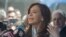 Former Argentinian President Cristina Fernandez de Kirchner speaks to reporters in Buenos Aires in October.