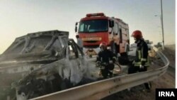 Yazd officials say police fired on the vehicle after it crashed through a checkpoint.