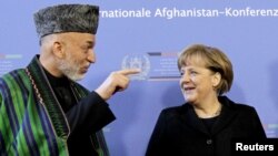 حامد کرزی رییس جمهور افغانستان و انگیلا مرکل صدراعظم آلمان