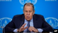 Russian Foreign Minister Sergei Lavrov gestures while speaking at his annual news conference in Moscow on January 18.