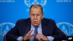 Russia - Russian Foreign Minister Sergei Lavrov gestures while speaking at his annual news conference in Moscow, January 18, 2024.