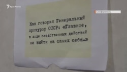 «Bu qara bir işaret». Maskalı insanlar qırımlı aq qorçalayıcılarnıñ ofisinde (video)