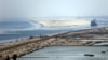 A general view of the Suez Canal from Al Salam "Peace" bridge on the Ismalia desert road. File photo